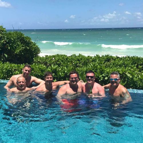 Group of guys inside a pool