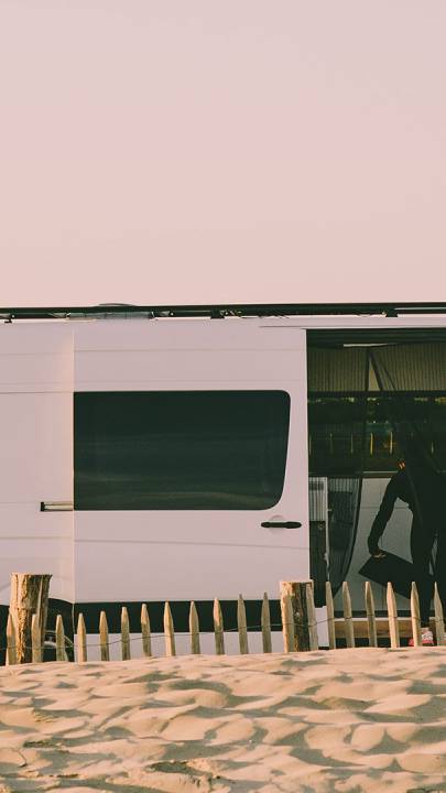 White van at the beach