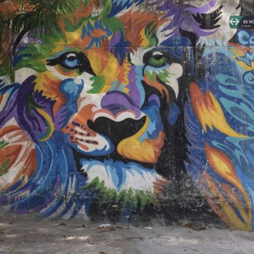 Painting of a colorful lion