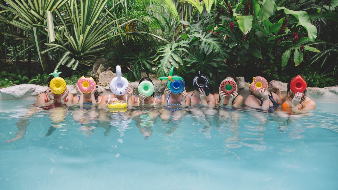 Bachelorettes partying in a pool